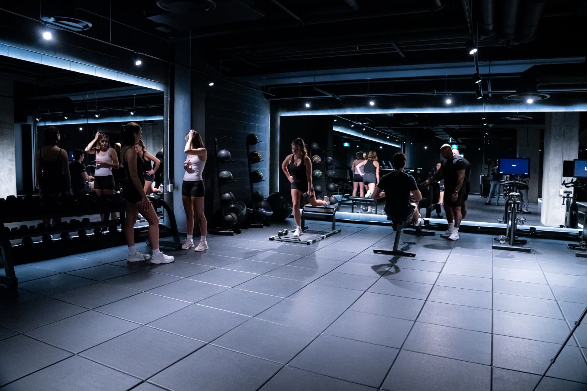 Fitness amenity with mirrors and free weights