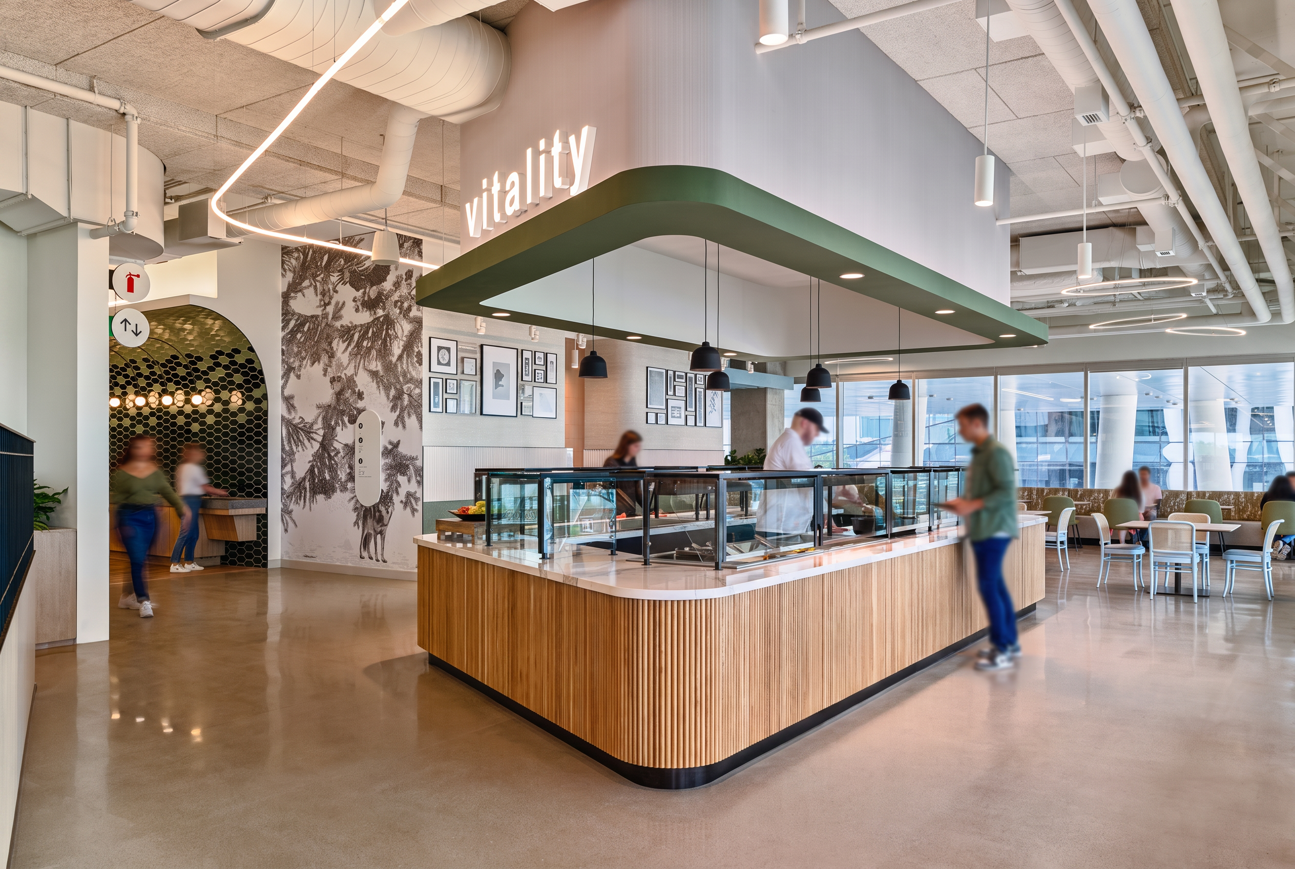 Completed workplace project with a food service counter and open café seating